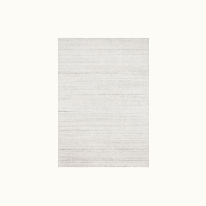 7' 6" x 9' 6" Ivory Rug